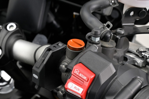 Śruba zaślepka do otworu lusterka  M10-P1.25/lewa pomarańczowa